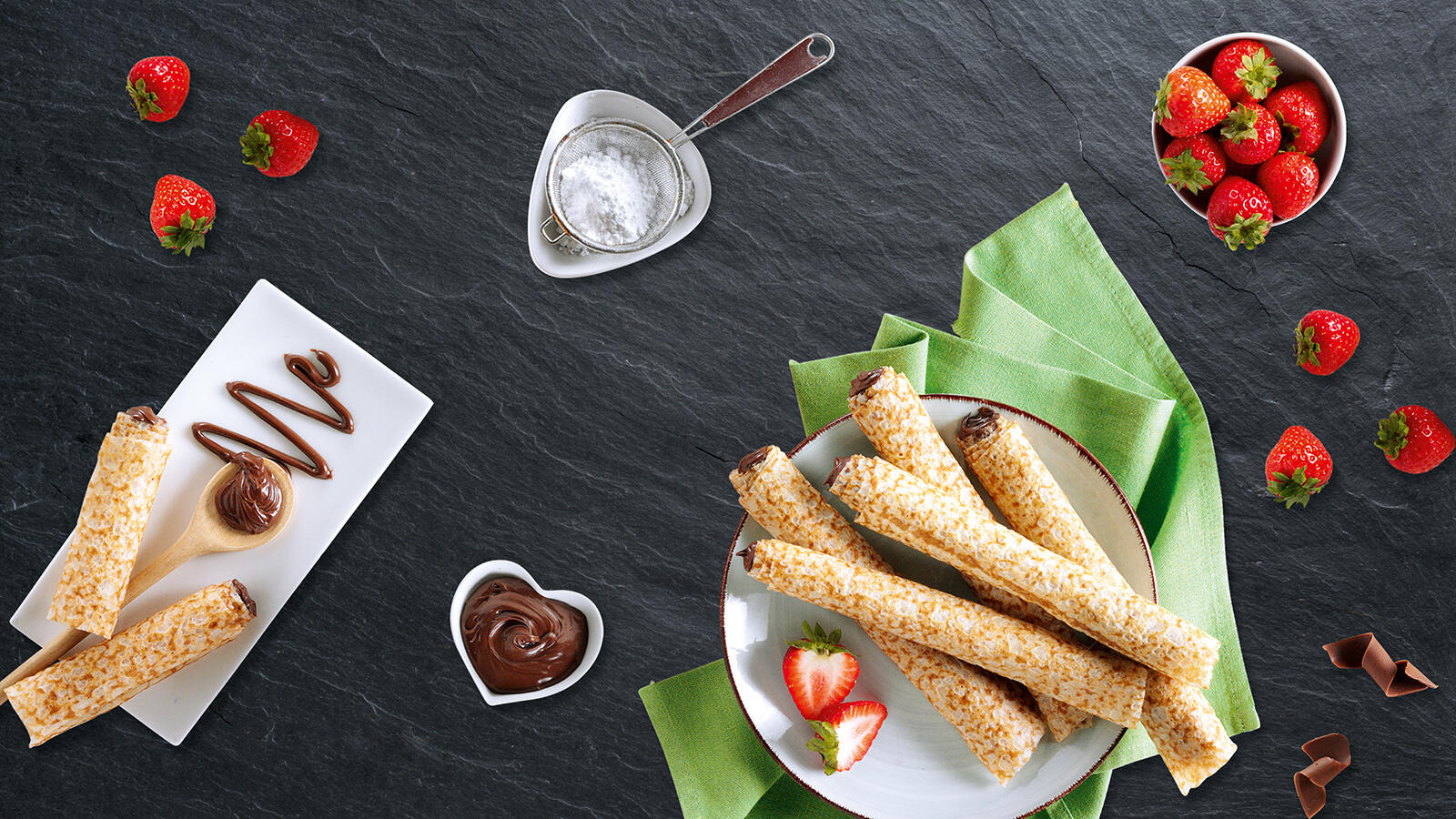Produktbild der IBIS Crêpes als Serviervorschlag auf einem Teller mit Erdbeeren
